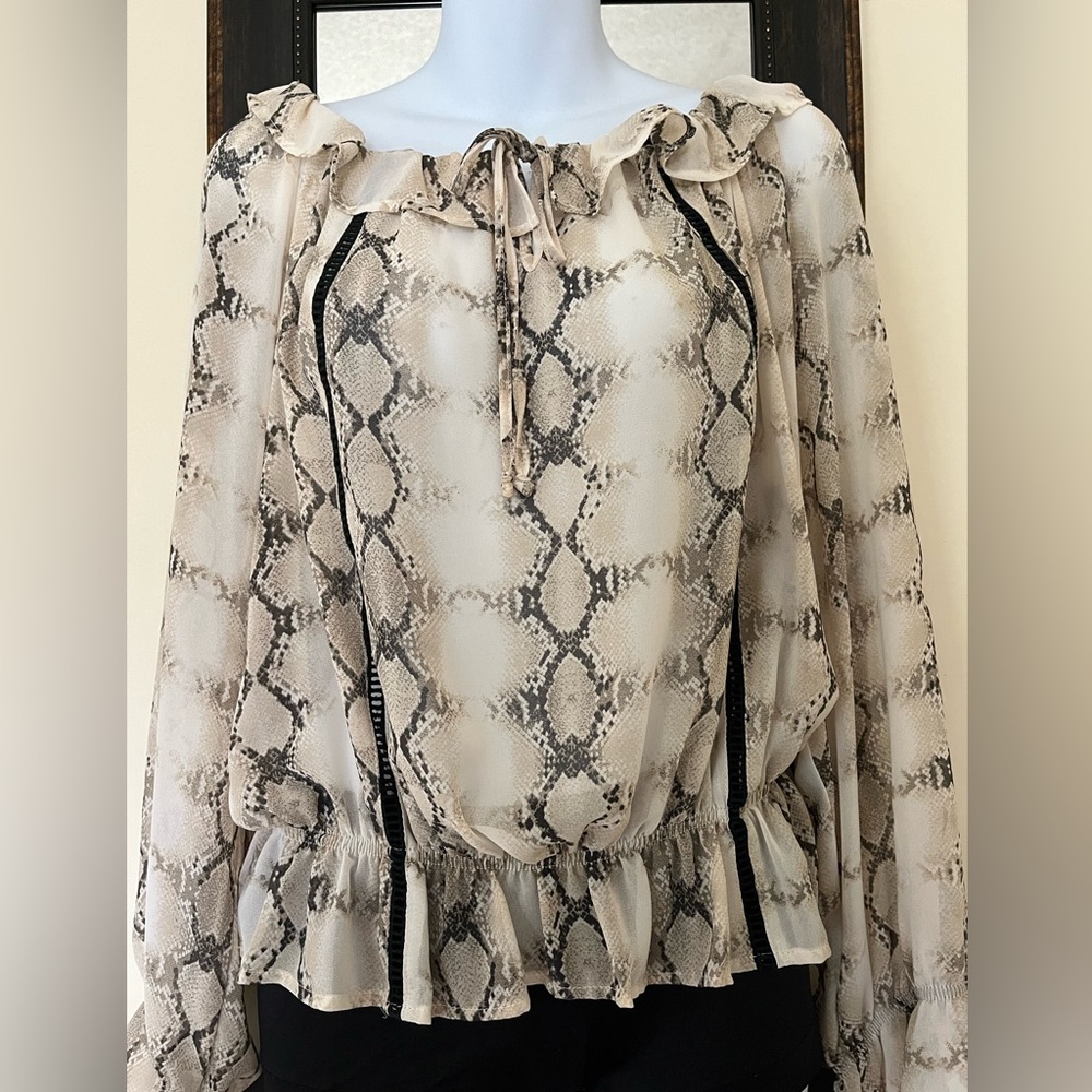 XOXO Beautiful snakeskin pattern blouse.